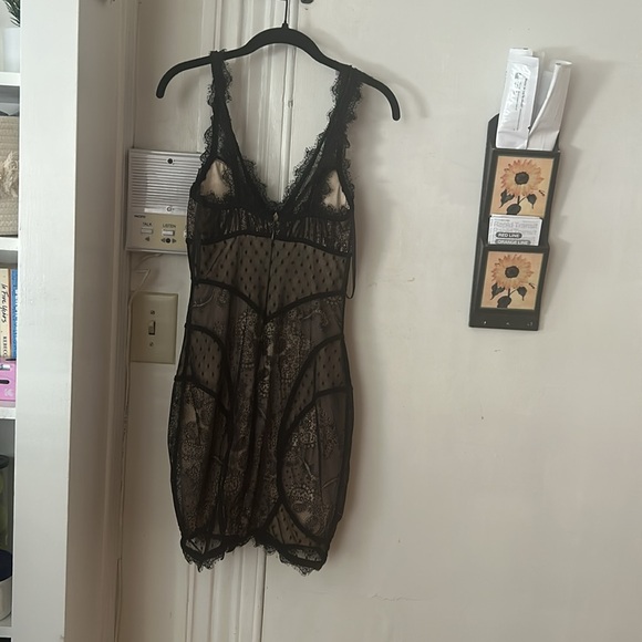 Bebe size small Lacey black tight dress. Zipper works. Never been worn! - Picture 4 of 5